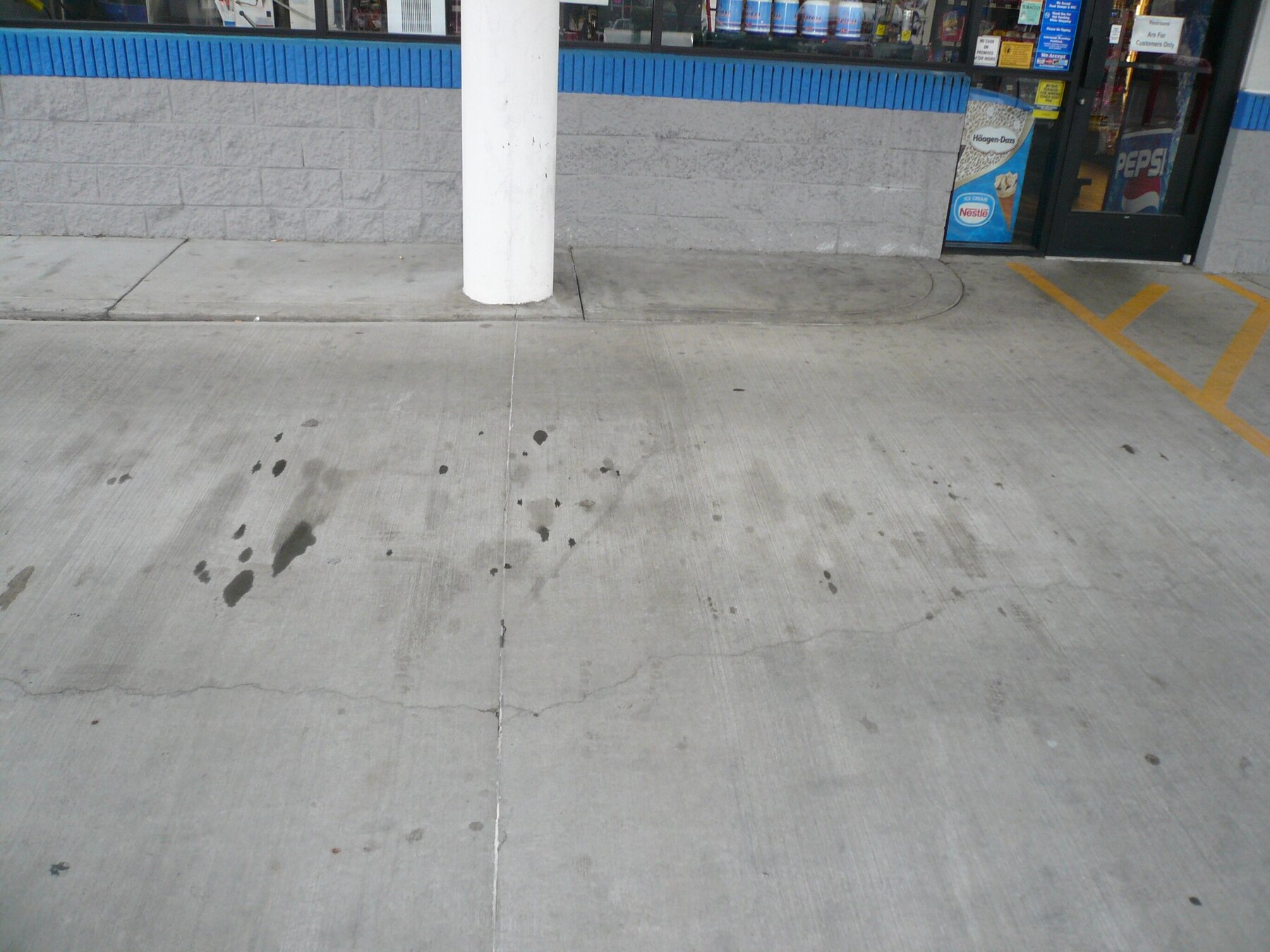 The same concrete area after EXIMO treatment with staining visibly reduced